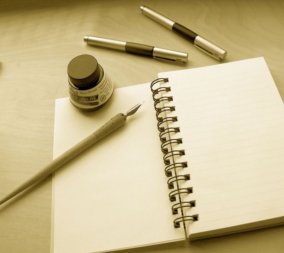 دفترچه و قلم
