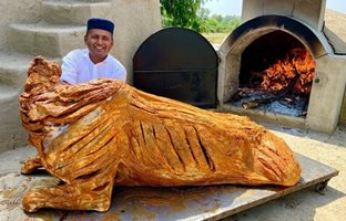 (ویدئو) فرآیند پخت یک گاو 200 کیلوگرمی در تنور به سبک آشپز مشهور پاکستانی 